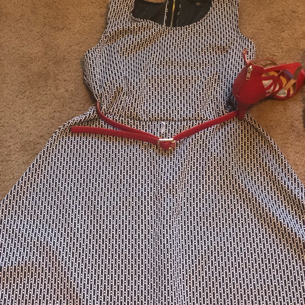 Black and white sleeveless dress with belt